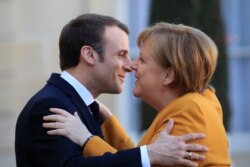 Кацлер Німеччини Анґела Меркель і президент Франції Емманюель Макрон