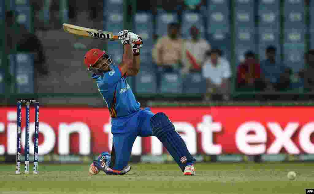 Afghanistan&#39;s Shafiqullah Shafaq bats against England at the Feroz Shah Kolta Cricket Stadium in New Delhi on March 23.