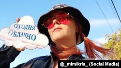 The absurdist virtual event is now marked on May Day in dozens of Russian cities. This woman even tweeted her contribution from Sydney, Australia.