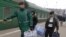 Unemployed migrant workers leaving Moscow last month.