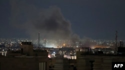 پر تهران تر برید وروسته له سیمې لوګي خېژي - د مارچ ۲۸مې انځور.