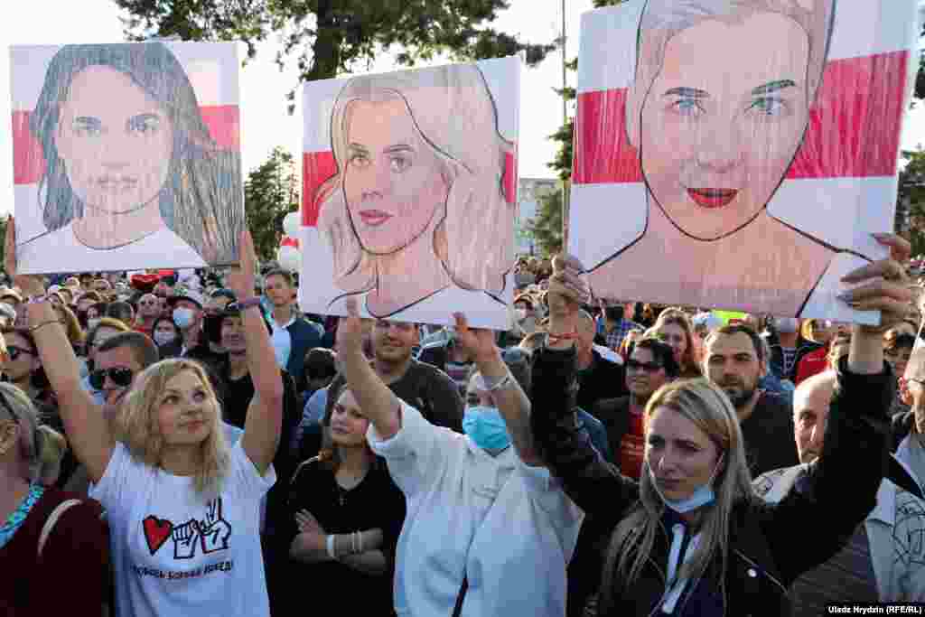 Supporters hold posters of the female trio who together are challenging Lukashenka&#39;s rule: (left to right) Svyatlana Tsikhanouskaya, Veranika Tsapkala, and Maryya Kalesnikava.&nbsp;​Tsikhanouskaya joined forces with Tsapkala and&nbsp;Kalesnikava, who both represented would-be presidential candidates who were barred from the August 9 ballot.