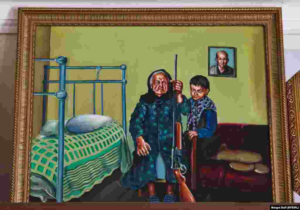 A painting in a souvenir shop in Stepanakert shows a grandmother holding a gun.