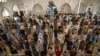 Muslim devotees offer prayers on the last Friday ahead of the Eid al-Fitr festival that marked the end of the Muslim holy month of Ramadan, at a mosque in Islamabad on May 22.