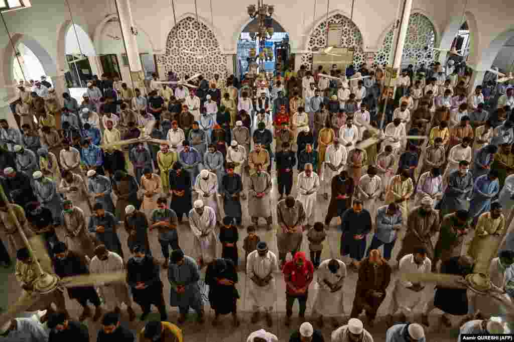 No physical distancing and very few masks as devotees gather at this mosque in the Pakistani capital, Islamabad, on May 22. They are among&nbsp;some 1.8 billion Muslims who celebrate Eid al-Fitr around the world.