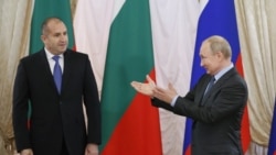 Russian President Vladimir Putin (R) meets with his Bulgarian counterpart Rumen Radev