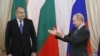 Russian President Vladimir Putin (R) meets with his Bulgarian counterpart Rumen Radev