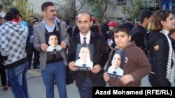 Protesters demonstrate in the Iraqi Kurdish city of Sulaymaniyah against the assassination of Kawa Garmyane, who was shot dead in December 2013 after reporting on corruption among regional leaders.