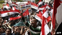 Pro-democracy activists gather on Tahrir Square in Cairo in April 