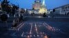 People lay candles in Kyiv to commemorate the deportation of the Crimean Tatars on May 18. 