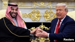 US President Donald Trump meets Saudi Crown Prince Mohammed bin Salman at the White House in Washington in November 2025.