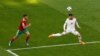 Soccer Football - World Cup - Group B - Morocco vs Iran - Saint Petersburg Stadium, Saint Petersburg, Russia - June 15, 2018 Iran's Alireza Jahanbakhsh in action with Morocco's Achraf Hakimi REUTERS/Lee Smith