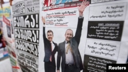 «Gürcüstan arzusu» koalisiyasından prezidentliyə namizəd Giorgi Margvelashvili-nin seçki plakatı – 28 oktyabr 2013