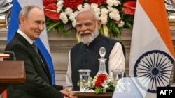  Președintele Rusiei, Vladimir Putin și prim-ministrul Indiei, Narendra Modi, după declarațiile comune de presă de la Palatul Hyderabad din New Delhi, pe 5 decembrie 2025.