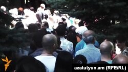Armenia - Ethnic Armenians line up outside the Syrian Embassy in Yerevan to vote in Syria's presidential election, 28May2014.