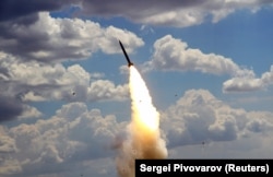 A Russian S-300 air-defense system launches a missile during a military exercise near Astrakhan in June 2019.