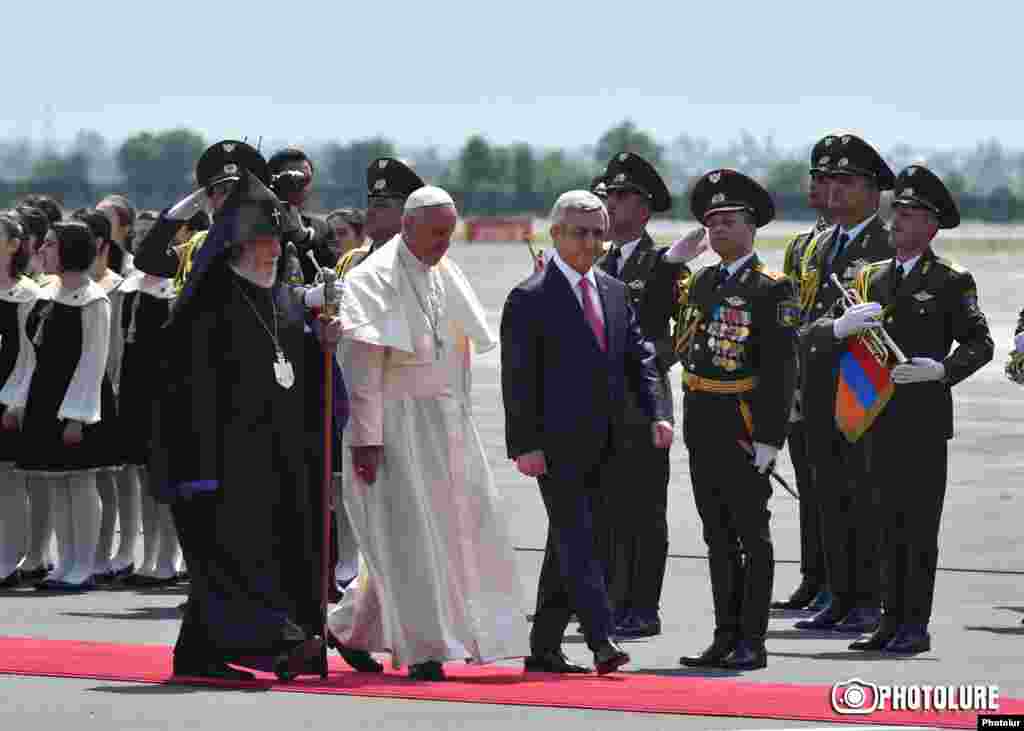 Armenia - President Serzh Sarkisian and Catholicos Garegin II greet Pope Francis on his arrival at Yerevan airport, 24Jun2016