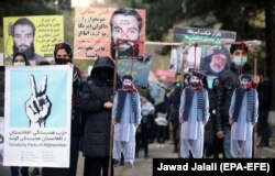 Afghans protest the release of Taliban prisoners in November 2019 in Kabul.