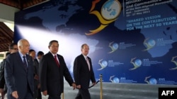 A handout photo of global leaders arriving ahead ofthe Non-Aligned Movement's 16th ministerial conference in Nusa Dua, Bali.