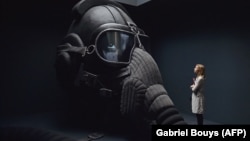 A visitor looks at an artwork in the Russian pavilion at the Venice Biennale in 2015. 