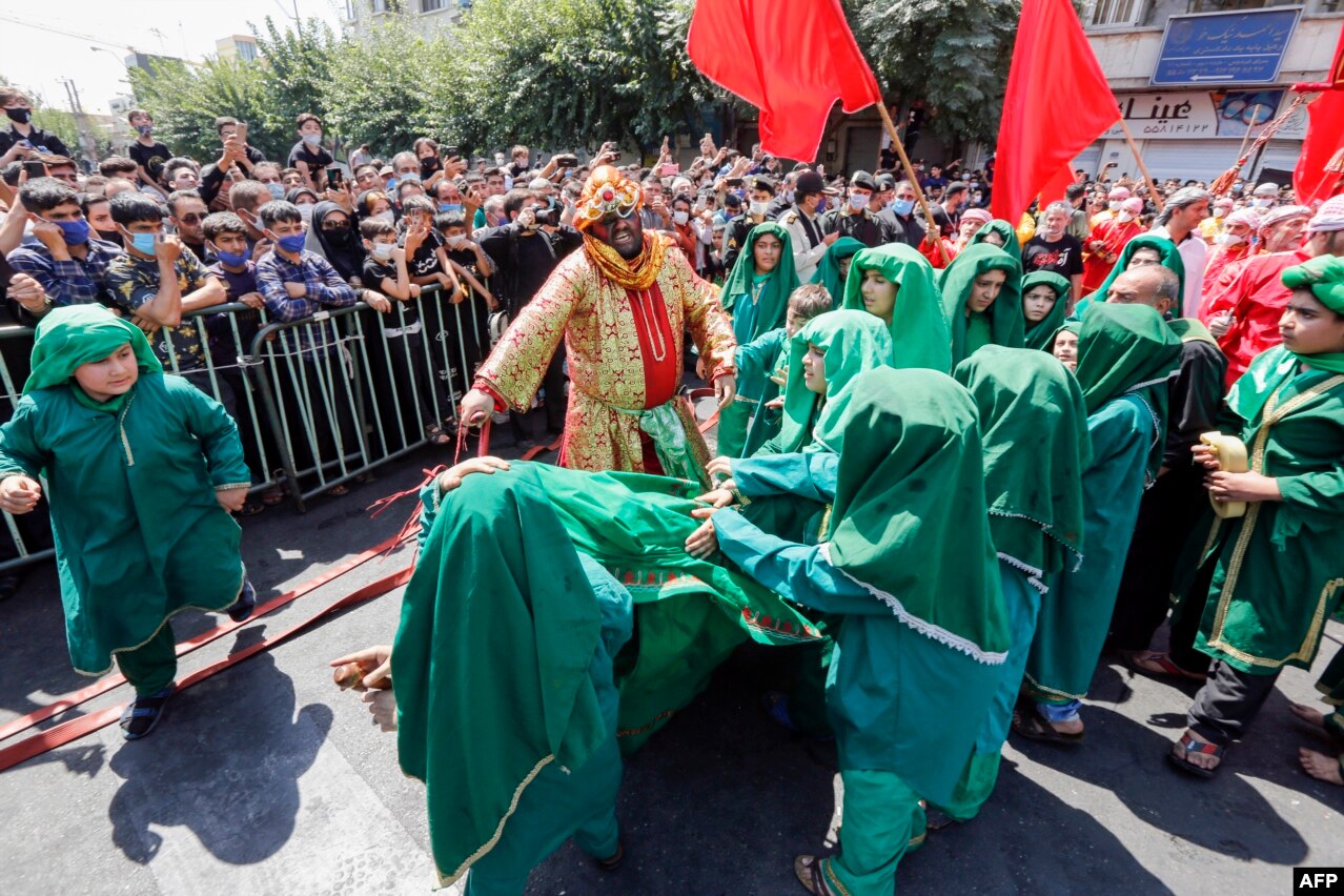 Children perform a reenactment on the 10th day of the month of Muharram, which marks the peak of Ashura.
