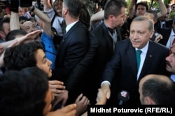 Turkish President Recep Tayip Erdogan presses the flesh on a trip to the Bosnian capital, Sarajevo, in May 2015.