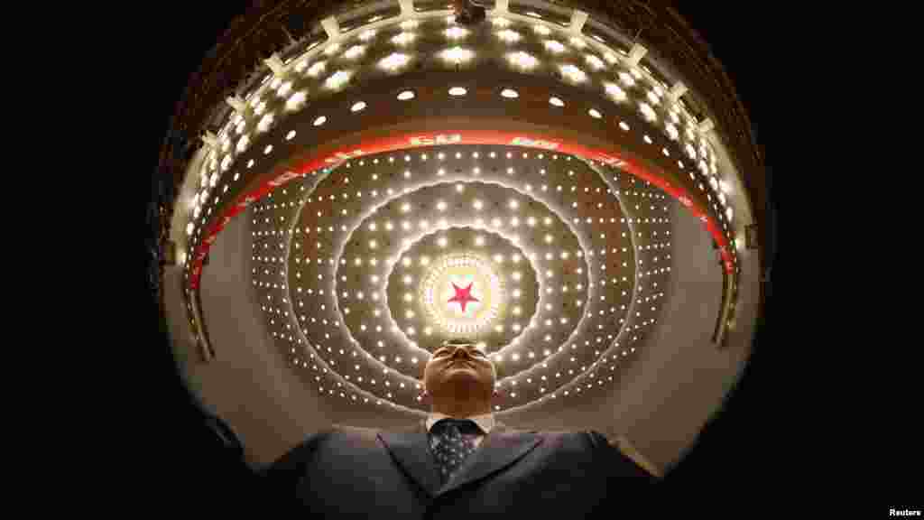 A security officer stands guard at the opening ceremony.