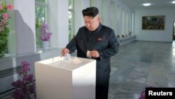 North Korean leader casts his vote in a previous election (file photo).