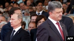 Владимир Путин и Петр Порошенко в Нормандии. 6 июня 2014 года