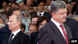 Ukrainian President Petro Poroshenko (right) and Russian President Vladimir Putin (left) exchanged barbs this week over a controversial naval incident off the coast of Crimea. 