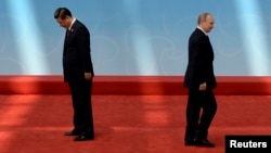 Российский и китайский лидеры на прошлогодней встрече в Шанхае