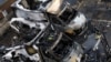 Charred remains of ambulances belonging to Hatzola, a Jewish community organization, which were set on fire in an incident that police say is being treated as an antisemitic hate crime, in London, on March 23