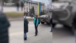 Ukrainians Wave Flags At Protest In City Seized By Russian Forces