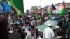 Thousands of Afghans demonstrated in the southeastern city of Khost to demand ceasefire from the warring sides on May 31.