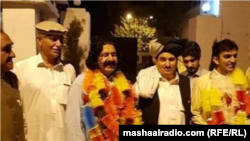 Ali Wazir (second left) and Mohsin Dawar (right), pictured after their release from jail, are members of a Pashtun civil rights movement. 