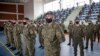 KOSOVO -- Kosovo Security Force (KSF) members wearing protective face masks line up during a peacekeeping mission deployment ceremony held at the army barracks in Pristina, March 9, 2021 