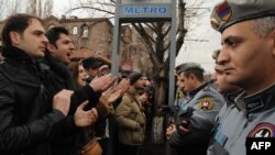 Armenian opposition supporters rally against President Serzh Sarkisian's election victory in front of his residence in Yerevan on February 21.