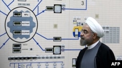 Iranian President Hassan Rohani visits the control room of a an Iranian nuclear facility in 2015.. 