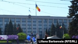 Moldova - Tricolor, State flag in front of government building, Chisinau, 30Apr2012