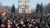 Protesters attend a rally in front of the parliament building in Chisinau on January 21.