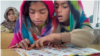 Pakistan - school in poor neighborhood in Dera Ismail Khan in Khyber Pakhtunkhwa Province - children education - screen grab