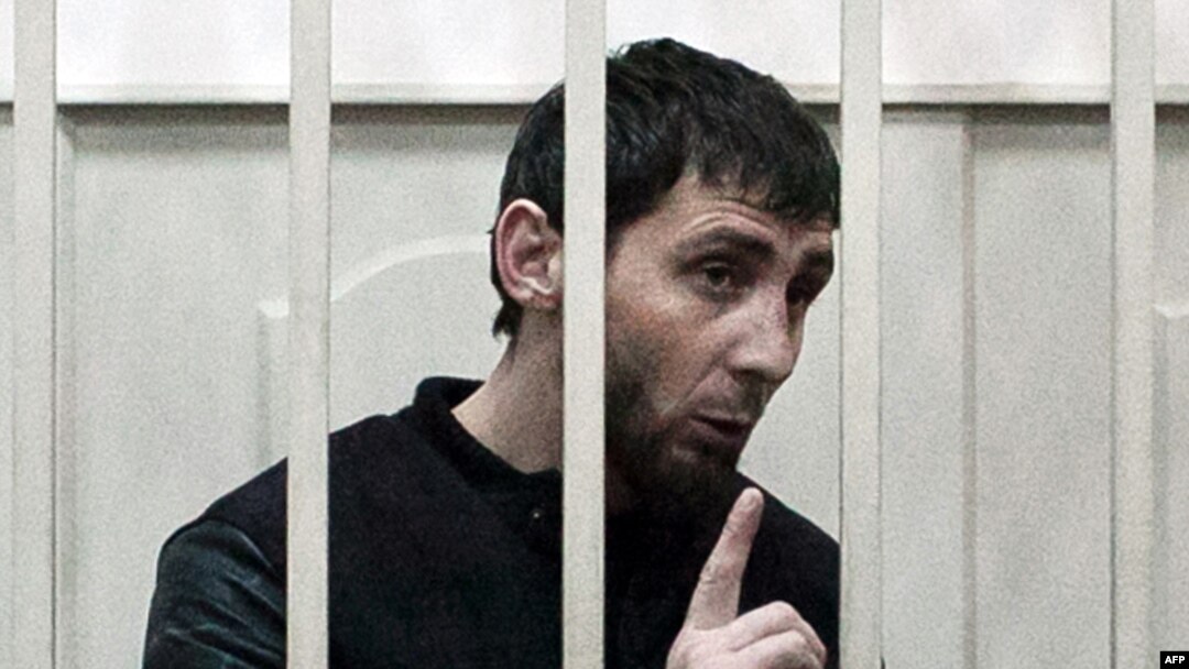 Zaur Dadayev, charged with the murder of Russian opposition figure Boris Nemtsov, speaks inside a defendants' cage at the Basmanny district court in Moscow on March 8.