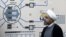 Iranian President Hassan Rohani visits the control room of a an Iranian nuclear facility in 2015.. 