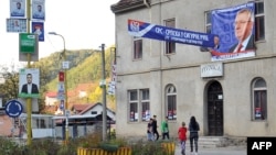 Campaign posters line the streets of the eastern-Bosnian town of Srebrenica.