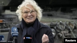 Christine Lambrecht, ministra germană a apărării, căreia i se cere demisia după un discurs cu totul inadecvat și lipsit de empatie pentru războiul din Ucraina. 