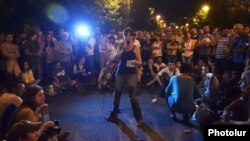 Armenia - An activist addresses protesters on Marshal Bagramian Avenue, 30Jun2015.