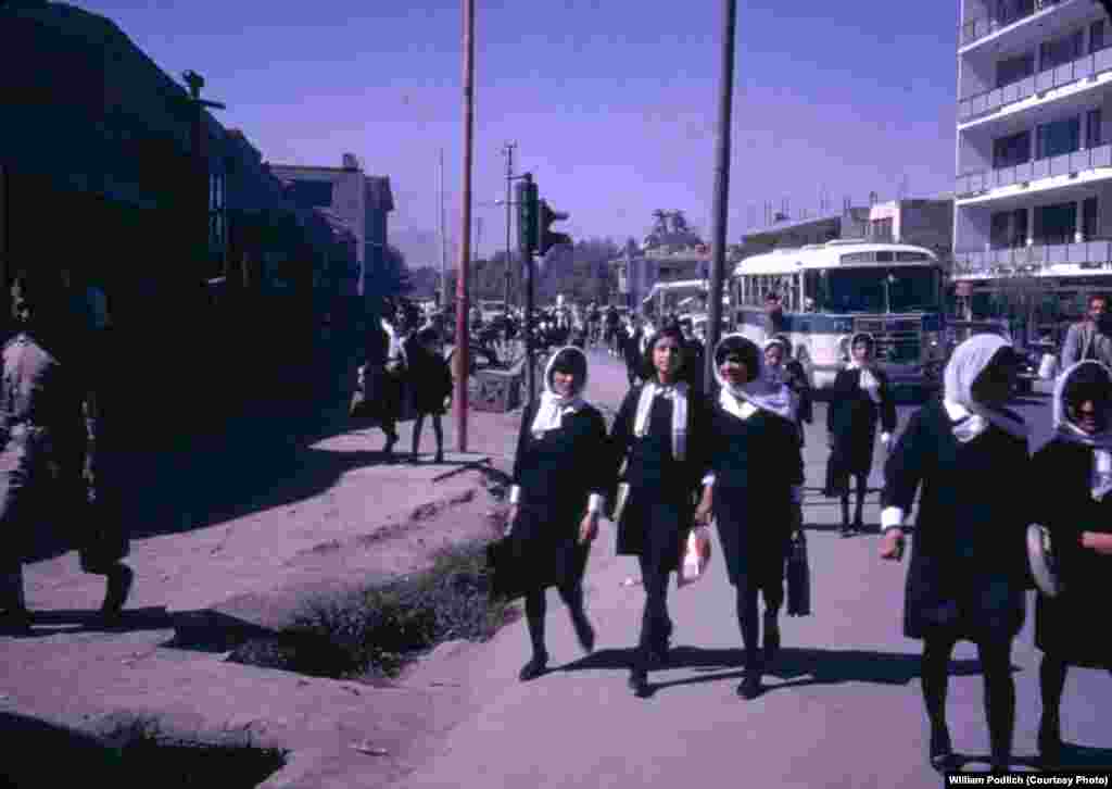 Afghan schoolgirls return home after attending school, an act that the Taliban would ban some 30 years later. &quot;Afghan girls, as well as boys, were educated up to the high school level, and although girls [and boys] wore uniforms, the girls were not allowed to wear a chadri (burqa) on their way to secondary school,&quot; says Peg Podlich. &quot;Able young women attended college, as did the men.&quot;