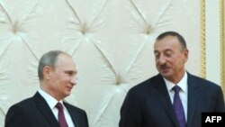 Vladimir Putin və İlham Əliyev.