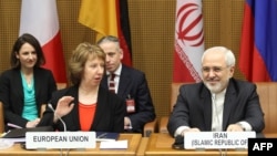 EU foreign policy chief Catherine Ashton (second from left ) and Iranian Foreign Minister Javad Mohammad Zarif (right) attend the last day of the EU 5+1 Talks with Iran at the UN headquarters in Vienna on February 20. 