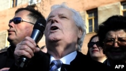 Fikret Abdic is welcomed by supporters after serving his sentence and leaving a prison in the northern Adriatic Croatian town of Pula in March 2012.